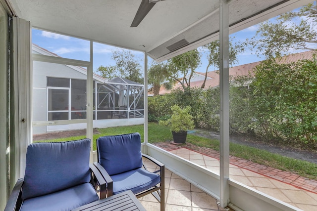 8503 Logia Cir, Boynton Beach, FL 33472 - sunroom / solarium with a wealth of natural light and a ceiling fan