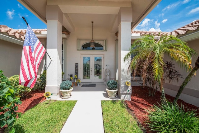 entrance to property featuring french doors