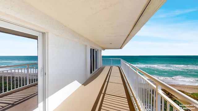 10980 S Ocean Dr Unit 714, Jensen Beach, FL 34957 - balcony featuring view of water and beach