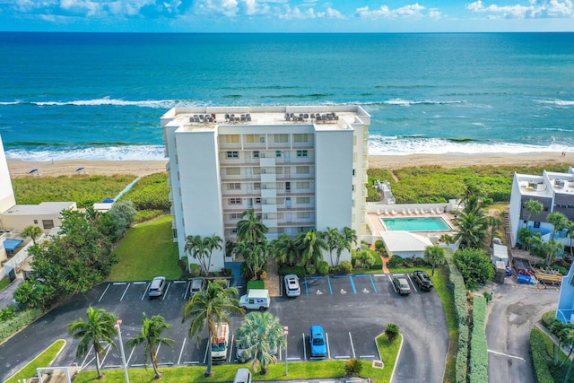 aerial view featuring a water view and a view of the beach