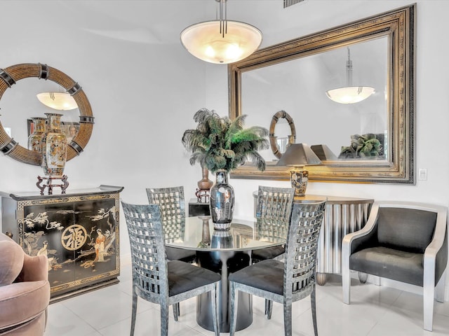 dining space with light tile patterned floors