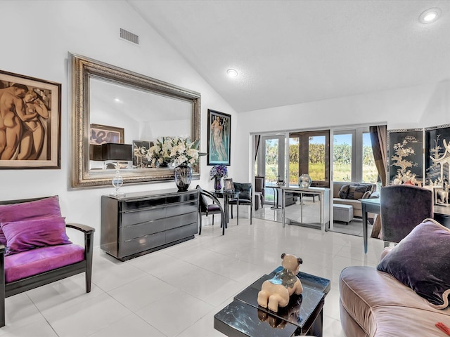 living room featuring french doors, high vaulted ceiling, and light tile patterned floors