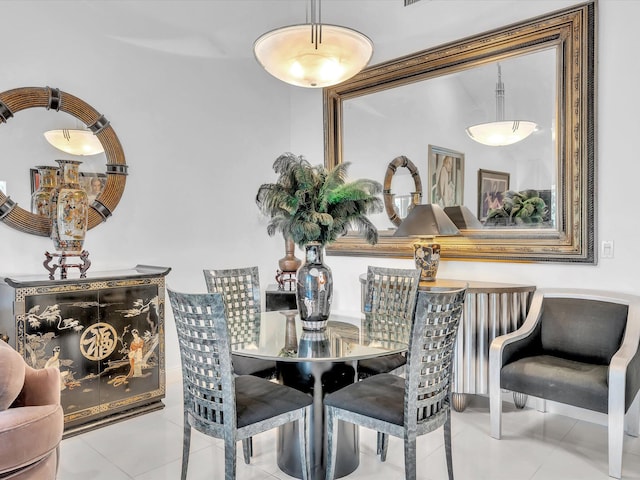 dining area featuring light tile patterned floors