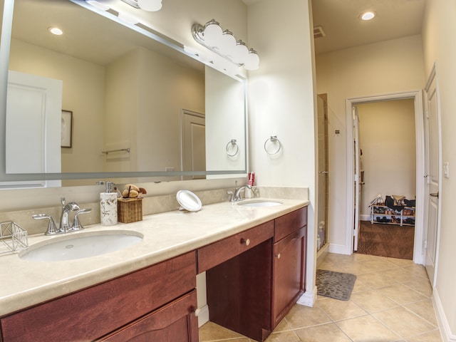 bathroom featuring vanity and tile patterned floors