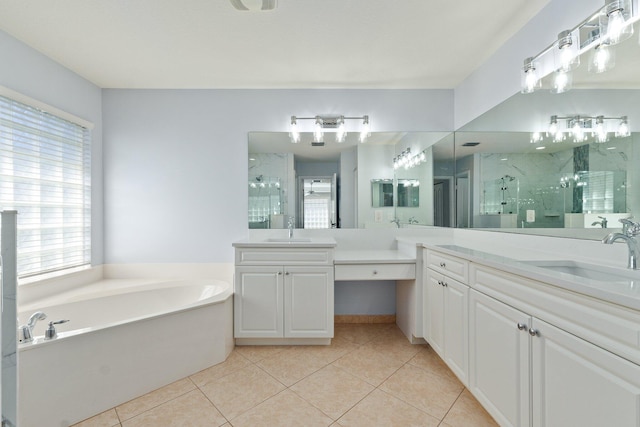 bathroom featuring vanity, shower with separate bathtub, and tile patterned floors