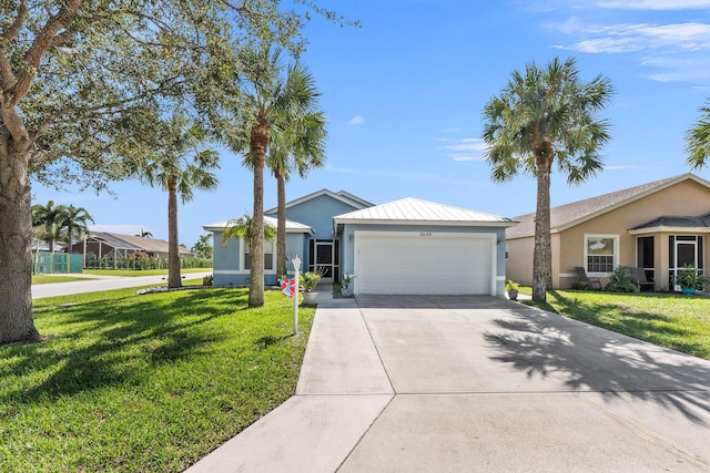 single story home featuring a front yard and a garage