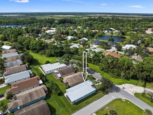 bird's eye view with a water view