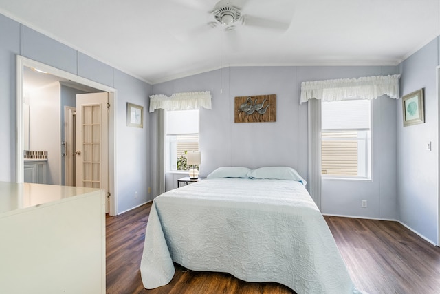 bedroom with dark wood-type flooring, ceiling fan, ornamental molding, and lofted ceiling