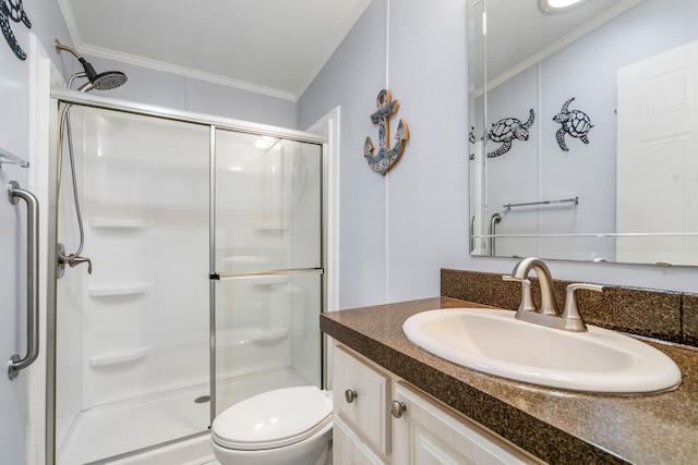 bathroom featuring toilet, an enclosed shower, vanity, and crown molding