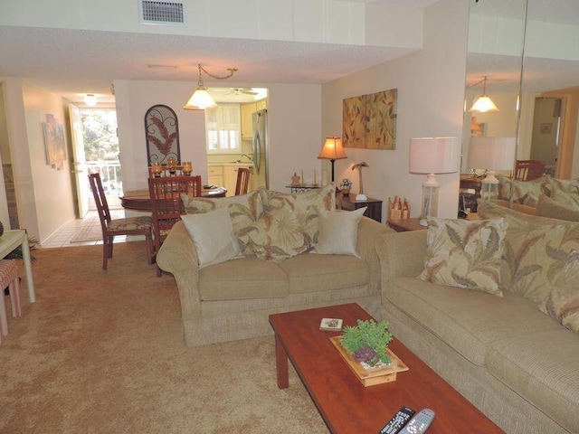 living room featuring carpet