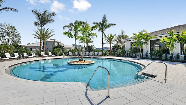 view of swimming pool featuring a patio