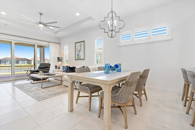 dining area with recessed lighting, a healthy amount of sunlight, and marble finish floor