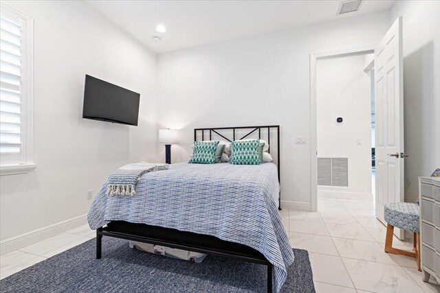 bedroom with visible vents, recessed lighting, marble finish floor, and baseboards
