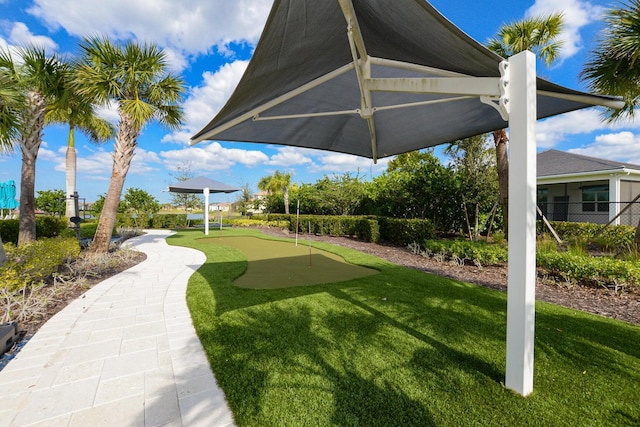 view of home's community featuring a lawn