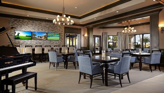 dining area with a chandelier, crown molding, a tray ceiling, and recessed lighting