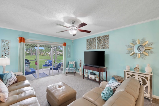 living room featuring crown molding, carpet, and a textured ceiling