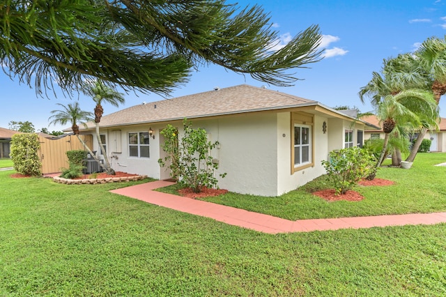 view of home's exterior featuring a lawn