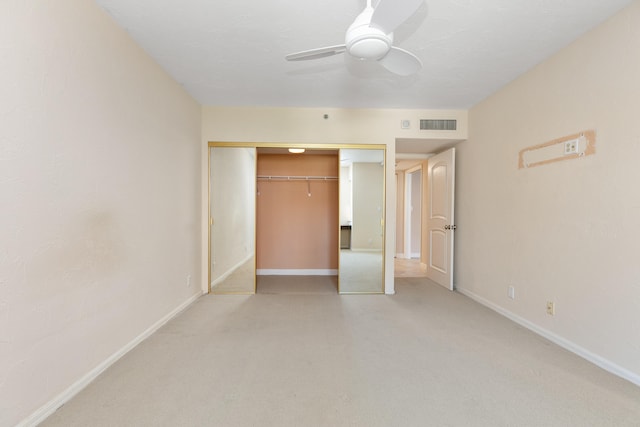 unfurnished bedroom with a closet and ceiling fan