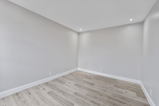 unfurnished room featuring light wood-type flooring