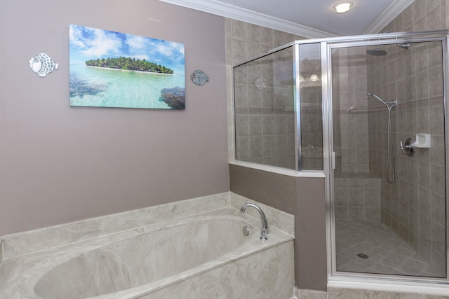 bathroom featuring plus walk in shower and ornamental molding