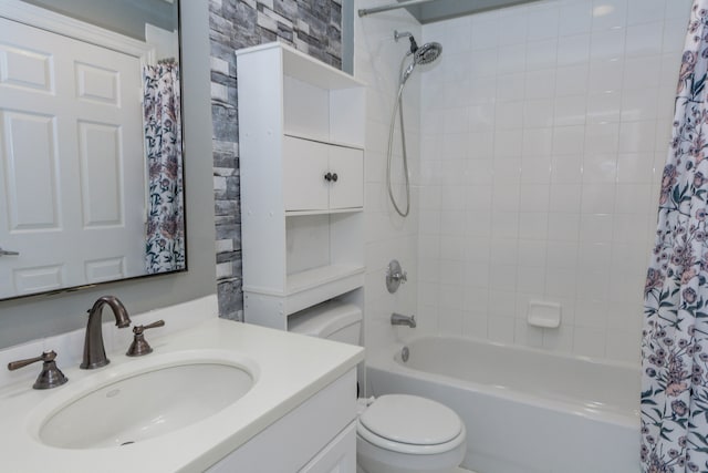 full bathroom featuring toilet, shower / tub combo, and vanity