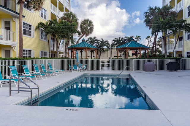 view of swimming pool with a patio area and a gazebo