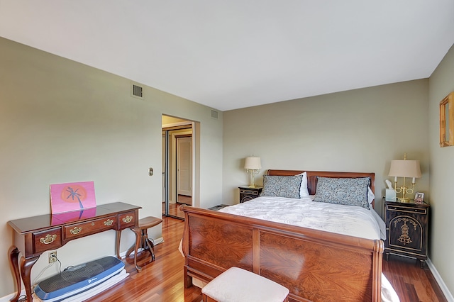 bedroom featuring hardwood / wood-style flooring