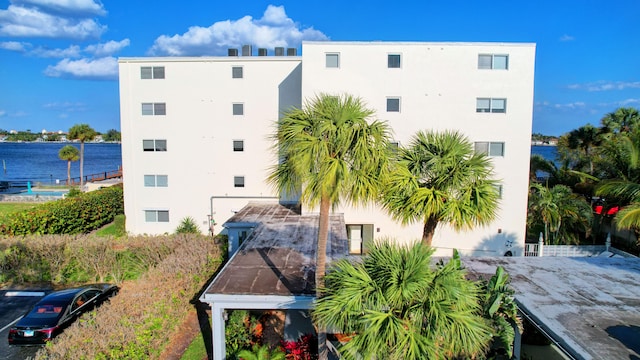 view of building exterior featuring a water view