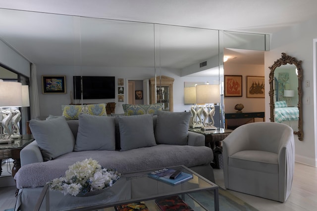 living room with light hardwood / wood-style floors