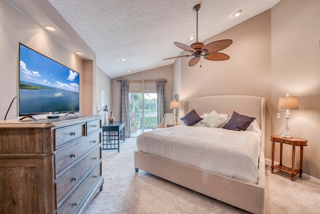 carpeted bedroom with ceiling fan, a textured ceiling, and vaulted ceiling