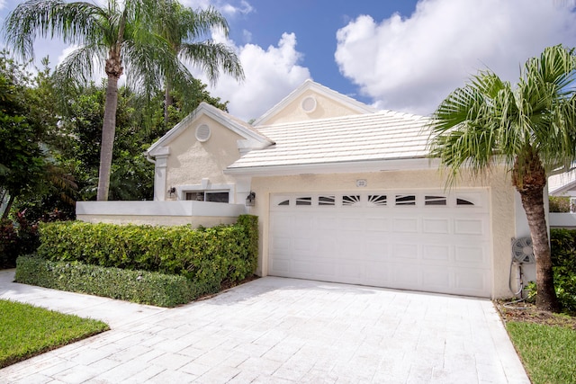 view of front of property featuring a garage