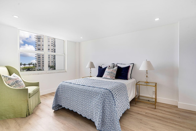 bedroom with light wood-type flooring