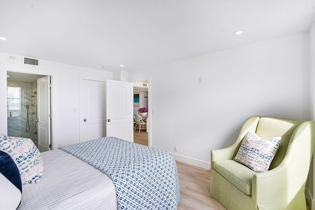 bedroom with light hardwood / wood-style flooring