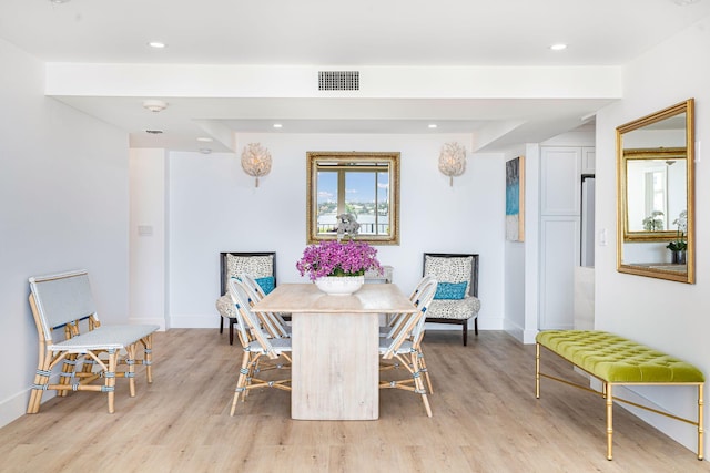 dining room featuring light wood-type flooring