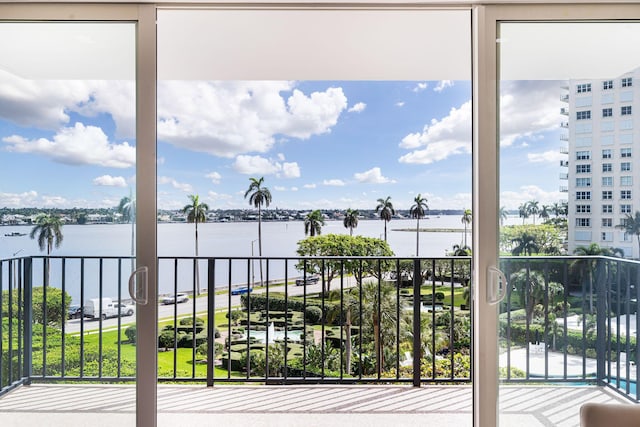 balcony featuring a water view