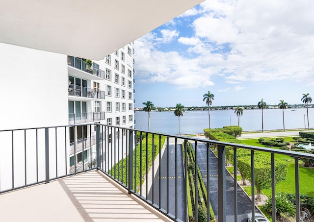 balcony featuring a water view