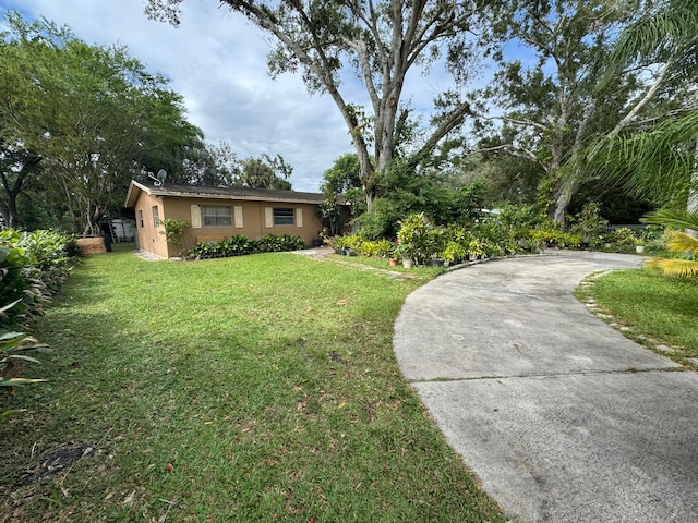 view of front of property with a front lawn