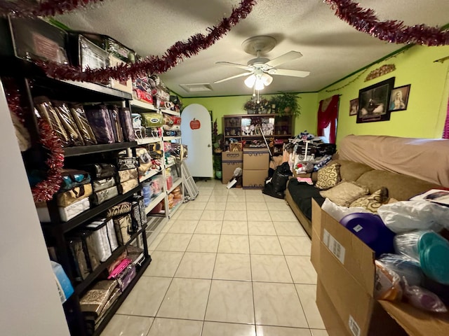 storage area featuring ceiling fan