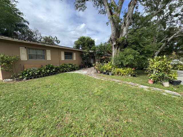 275 SE 16th Ave, Okeechobee, FL 34974 - view of grassy yard