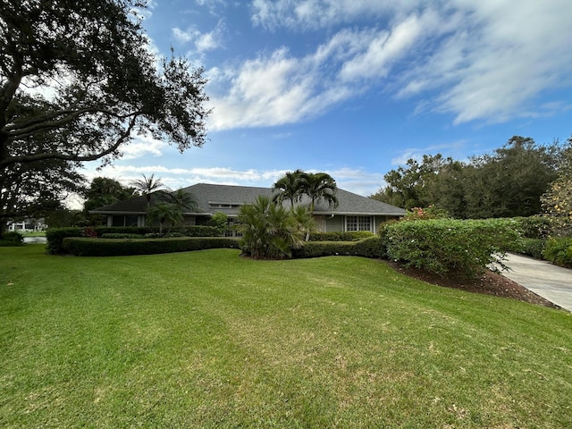 view of front of home with a front yard