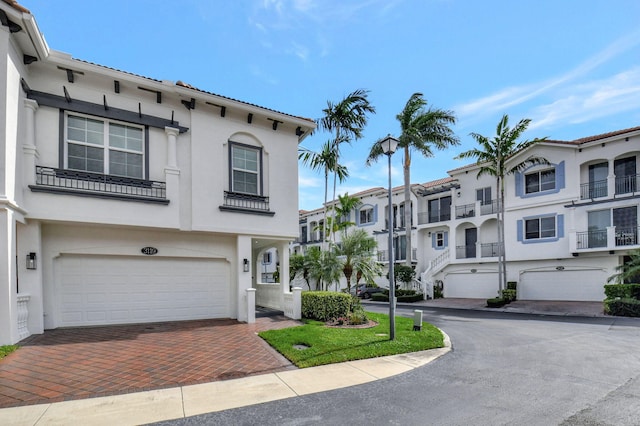 view of front of property with a garage