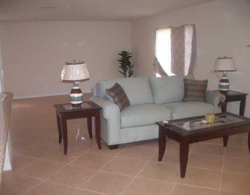 living room featuring tile patterned floors