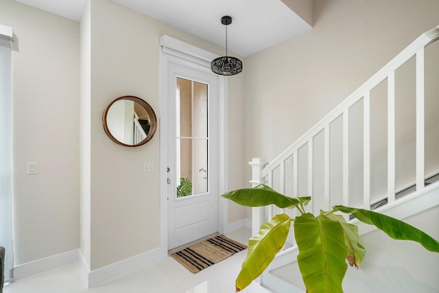 view of tiled foyer entrance