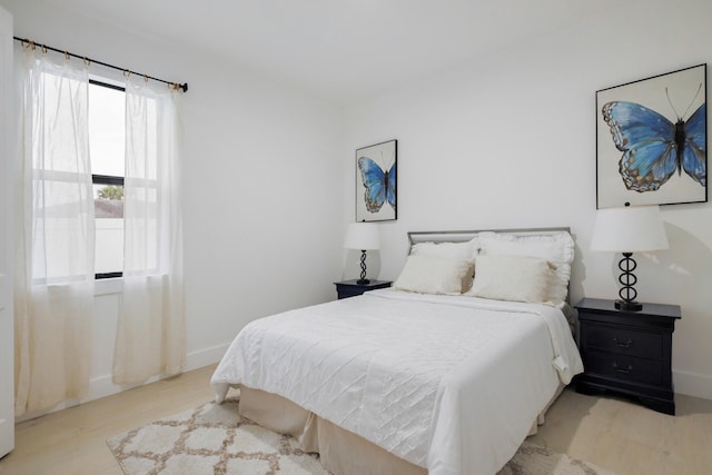 bedroom featuring light hardwood / wood-style floors