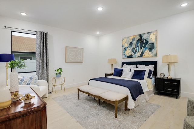 bedroom with light hardwood / wood-style flooring