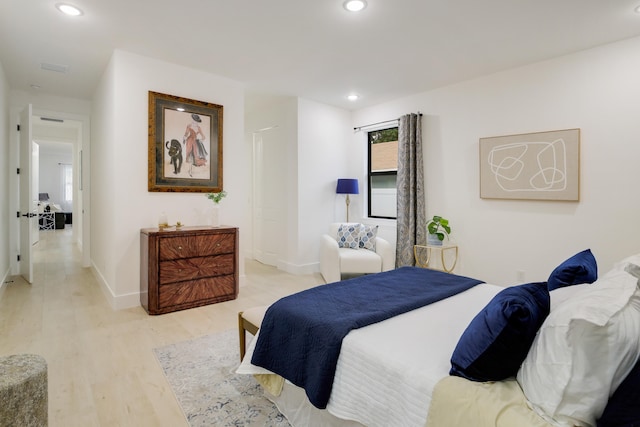 bedroom featuring light wood-type flooring