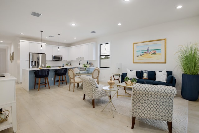 living room featuring light hardwood / wood-style floors