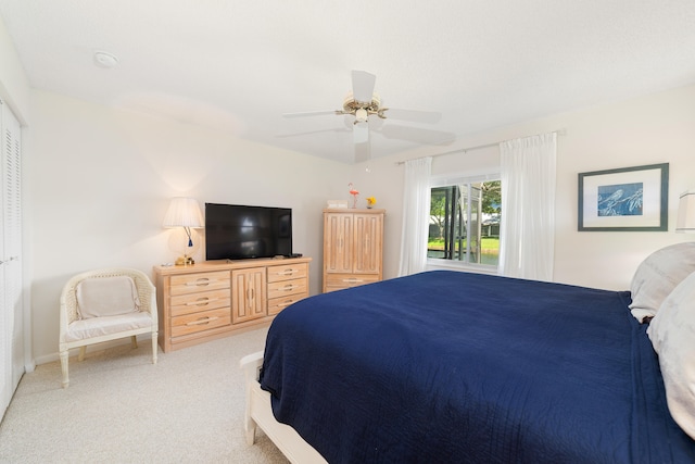 bedroom with carpet and ceiling fan