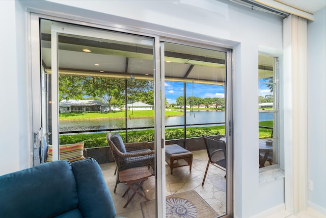 sunroom with a water view