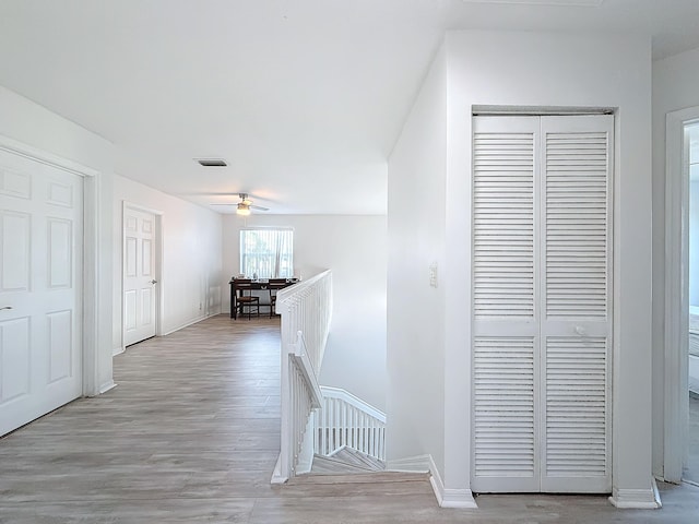 hallway featuring light wood-type flooring